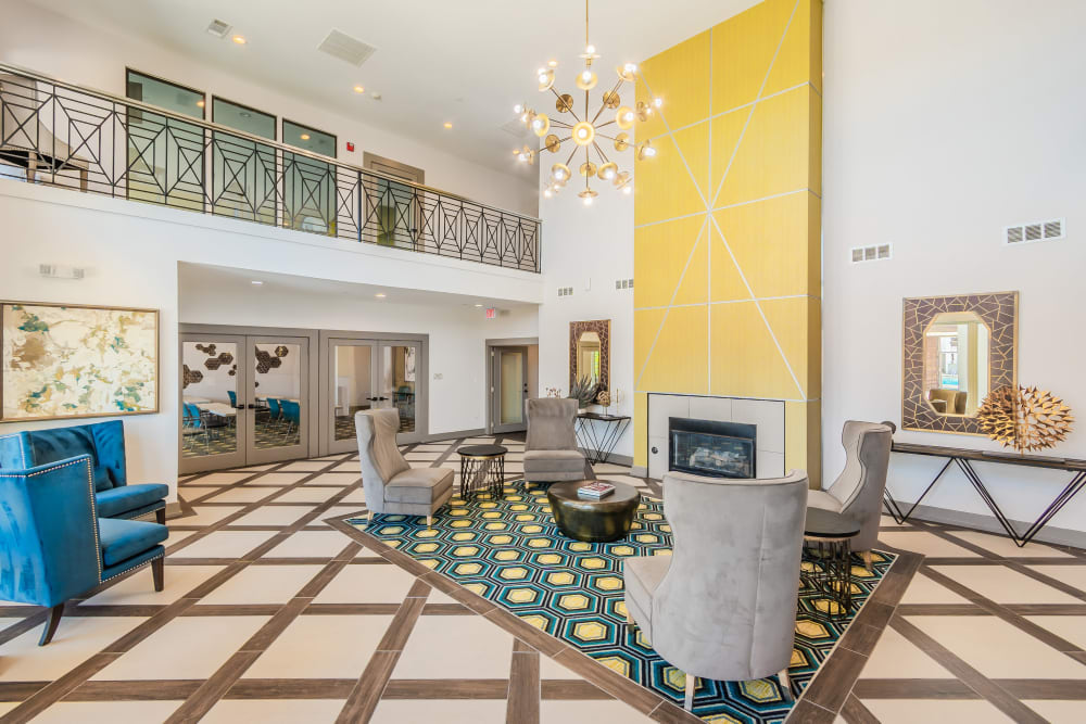 Front lobby with lounge seating and fireplace at The Spring at Silverton in Fort Worth, Texas.