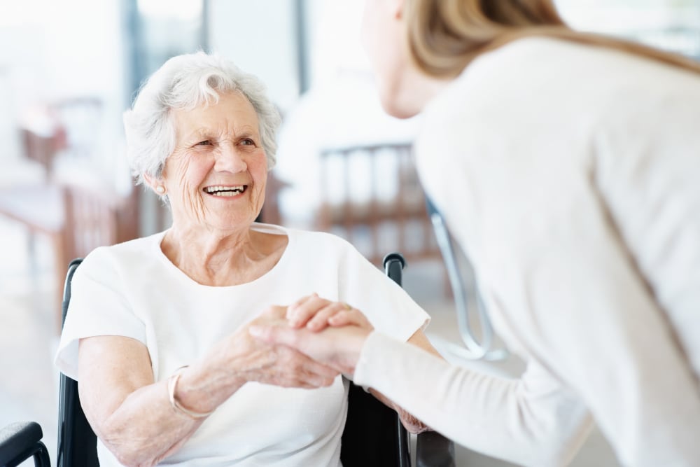 Resident sitting on chair  at Vista Prairie at Fieldcrest in Sheldon, Iowa