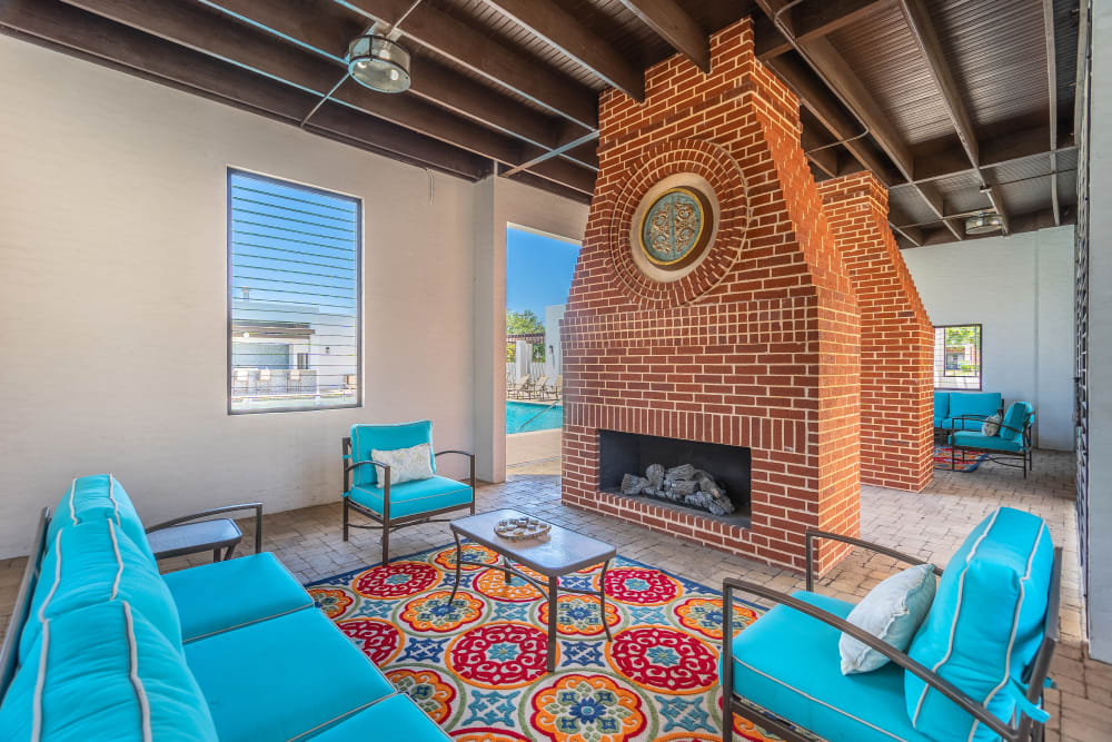 Luxurious outdoor lounges with fireplaces at The Spring at Silverton in Fort Worth, Texas.