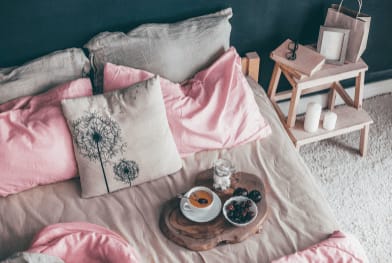 Bedding with pink pillows