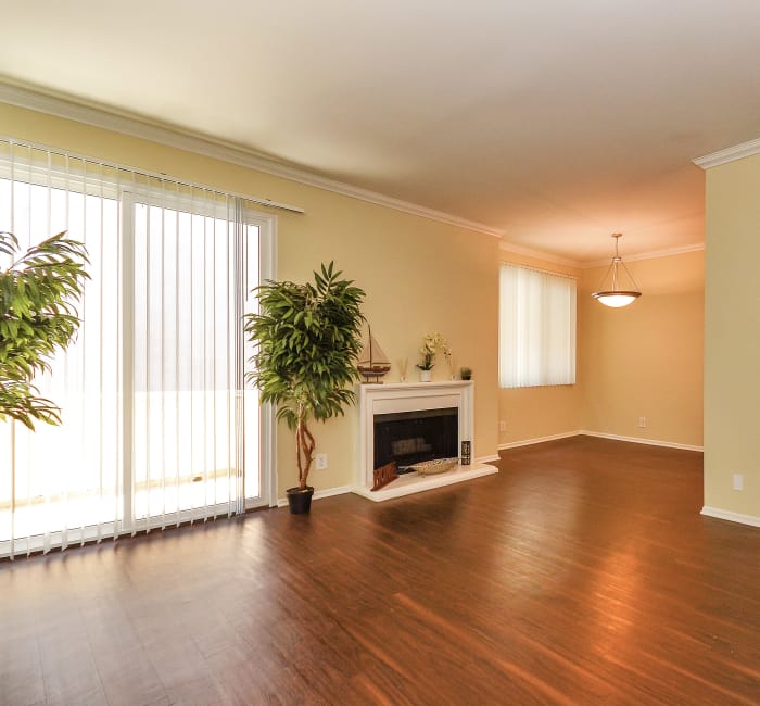 Living room with fireplace and hardwood floors at IMT Beverly Arnaz in Los Angeles, CA