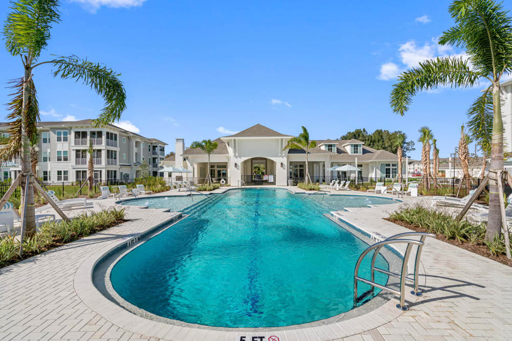 Sparkling resort-style swimming pool at The Griffon Vero Beach | Apartments in Vero Beach, Florida