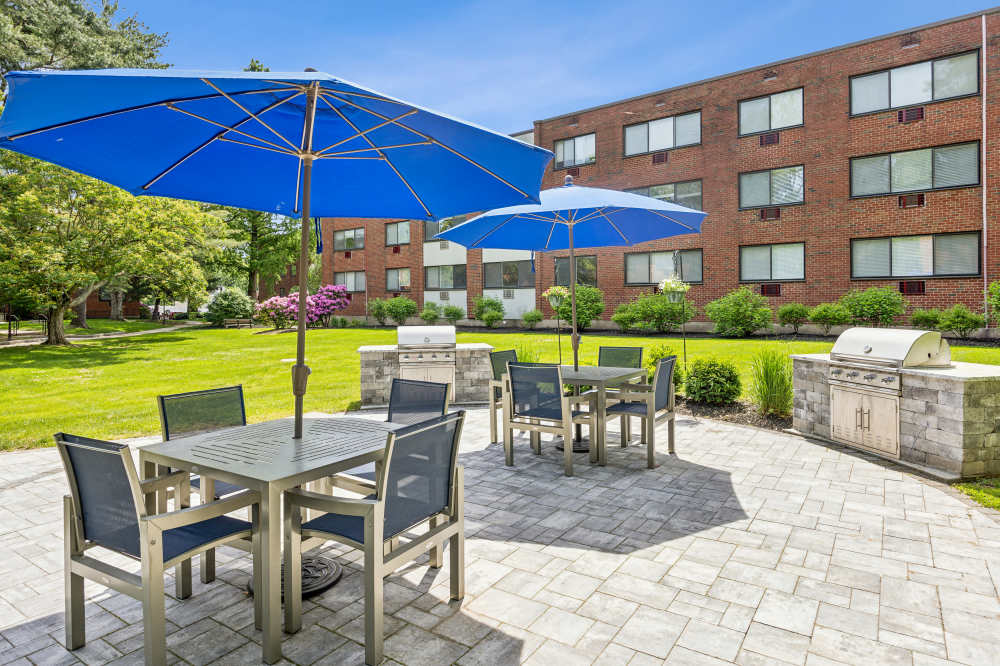 Umbrella seating at Eagle Rock Apartments at West Hartford in West Hartford, Connecticut