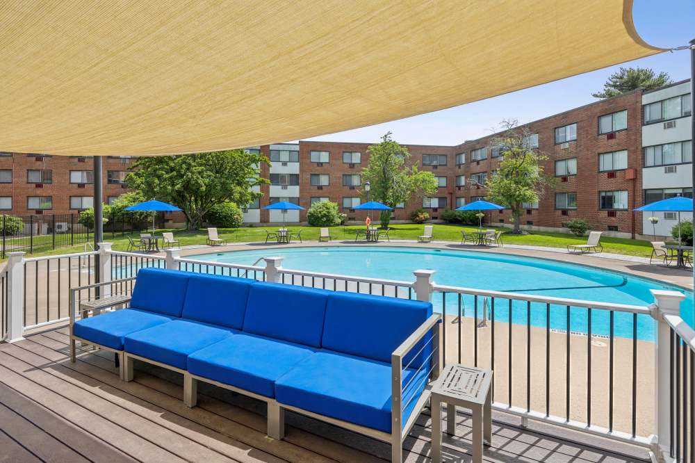Pool and bench at Eagle Rock Apartments at West Hartford in West Hartford, Connecticut