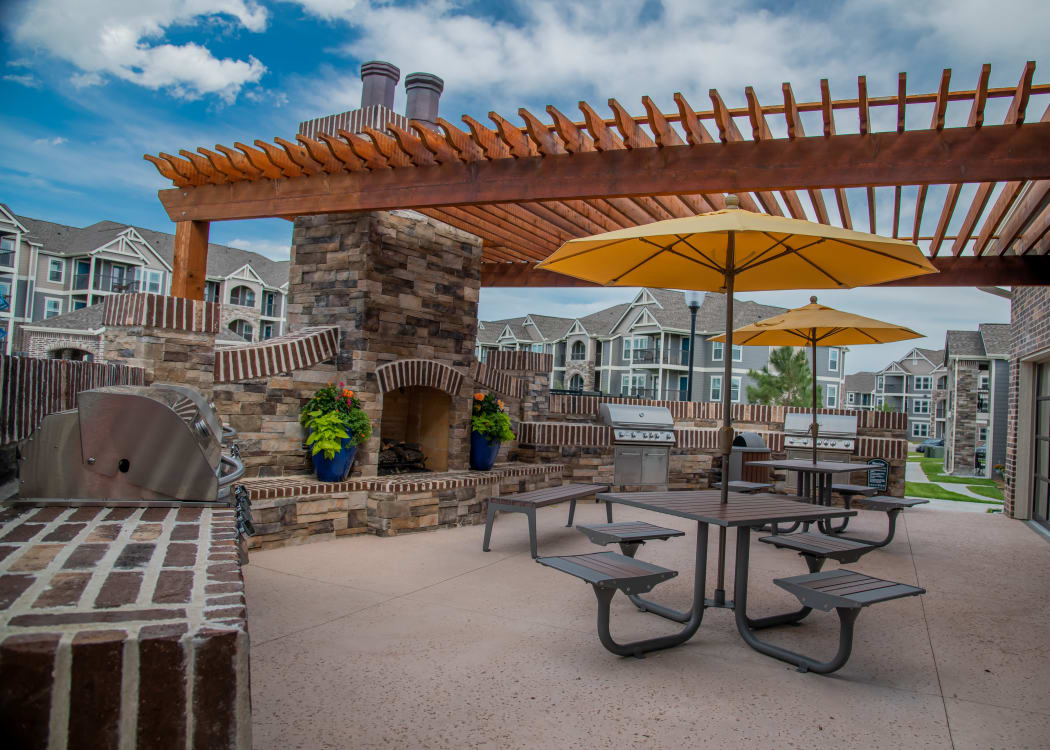 Outdoor grill and lounge area at Cottages at Crestview in Wichita, Kansas
