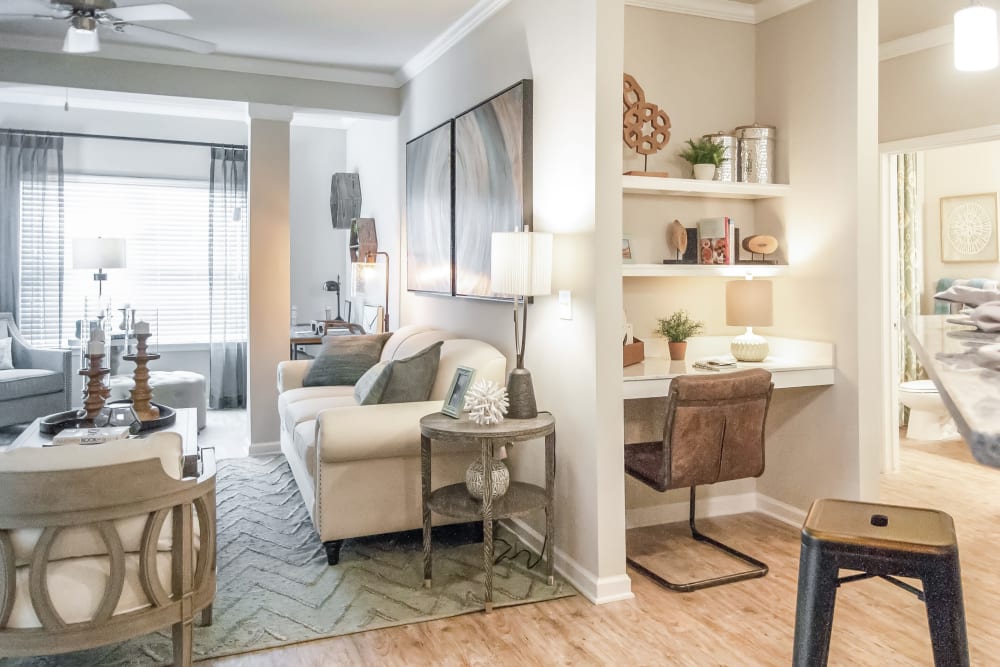 Gorgeous, sleek living room at Lullwater at Blair Stone in Tallahassee, Florida
