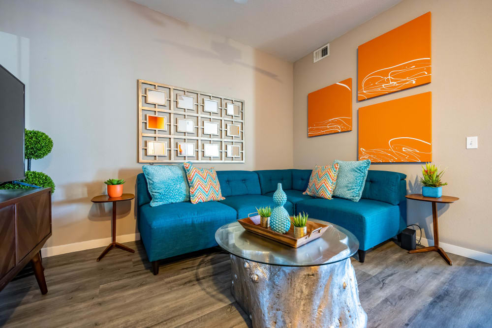 Living room with beautiful furnishings in a model home at Tempe Metro in Tempe, Arizona