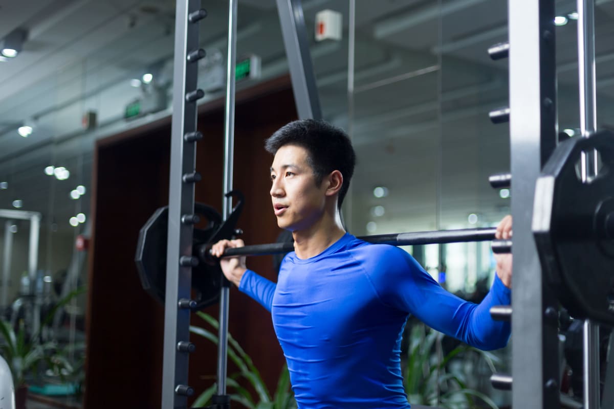 A resident lifting weights at Marq Promenade in Westminster, Colorado