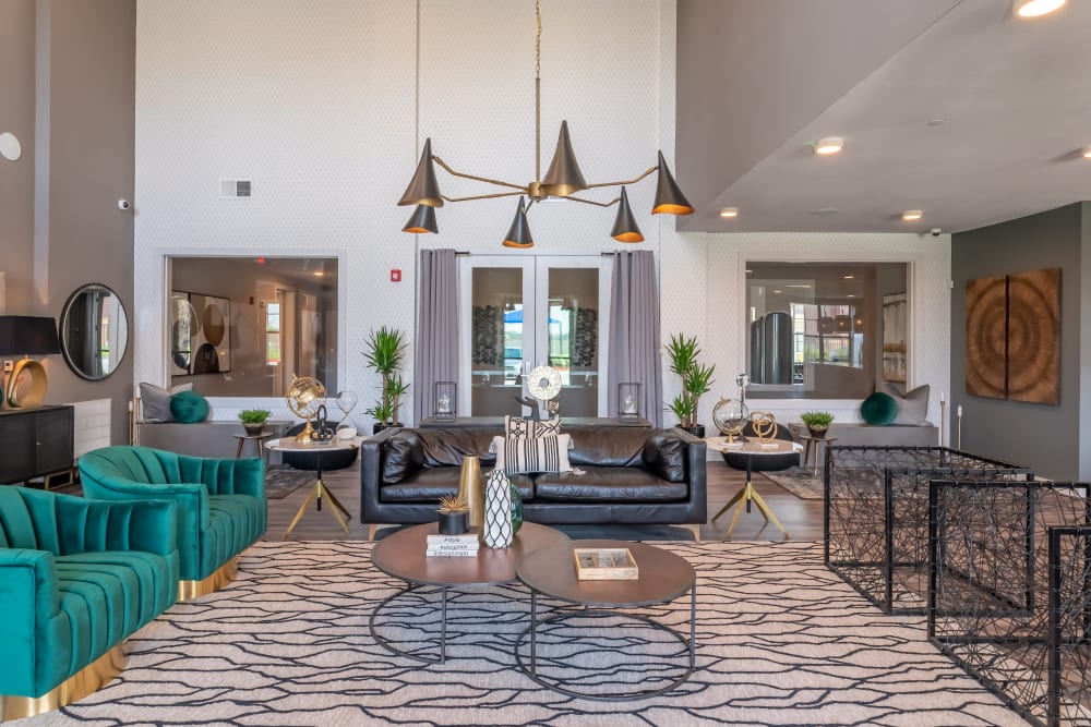 Lavishly decorated resident clubhouse interior at a luxury multifamily property by Electra America in Lake Park, Florida
