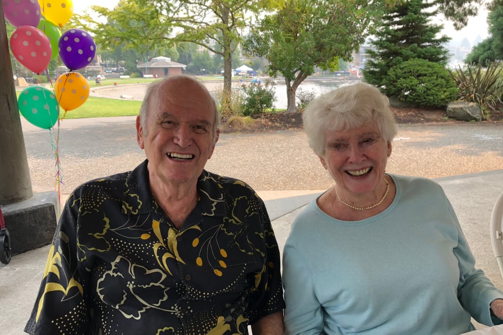 Resident couple enjoying the outdoors near Merrill Gardens at Kirkland in Kirkland, Washington. 
