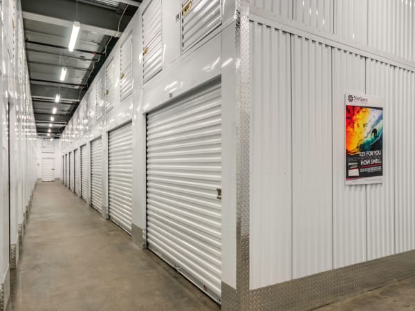 Hallway climate controlled storage units at StorQuest Self Storage