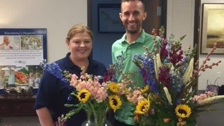 Aaron Sears from Plantology Emporium bringing flowers to Harmony