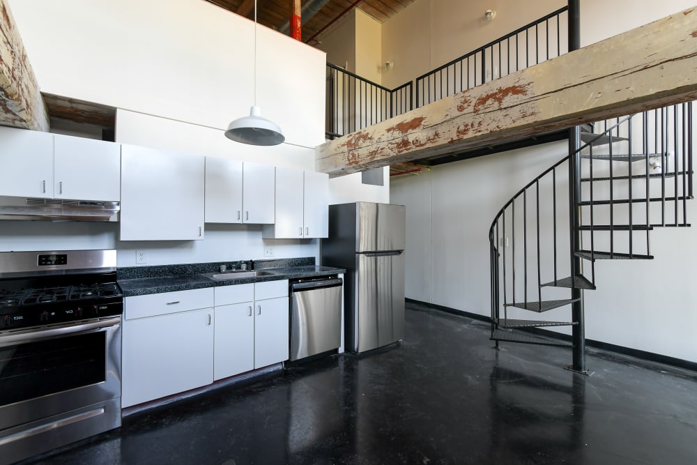 Chef-inspired kitchens in our loft apartments at Fulton Cotton Mill Lofts in Atlanta, Georgia