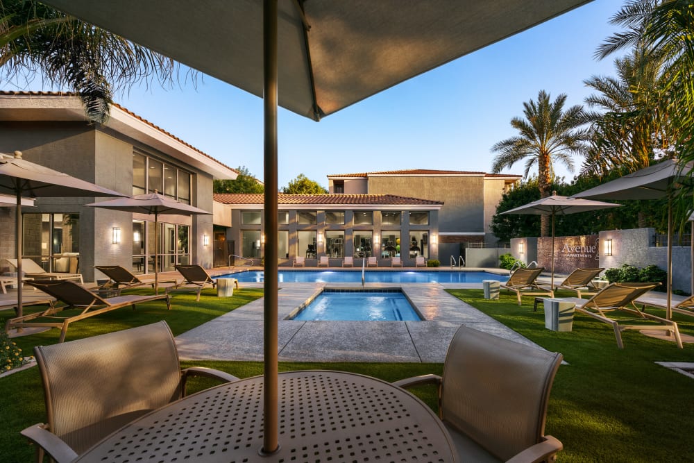 Sparkling pool and shaded seating at Avenue 25 in Phoenix, Arizona