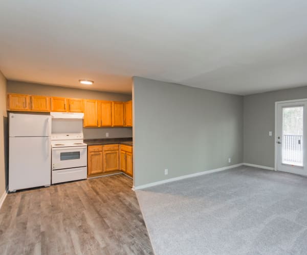Kitchen and living room at Gibson Creek Apartments in Madison, Tennessee