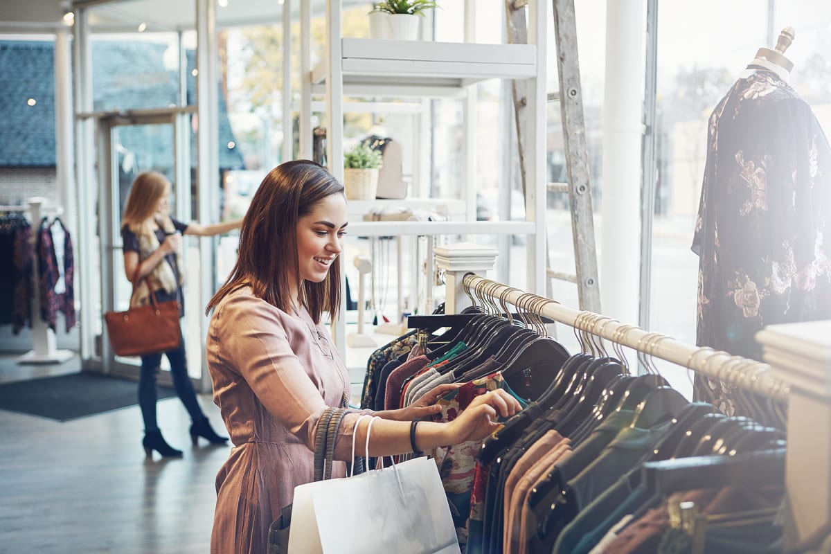 Young professional woman out shopping at a local store in Morton Grove, Illinois near The Residences at Sawmill Station