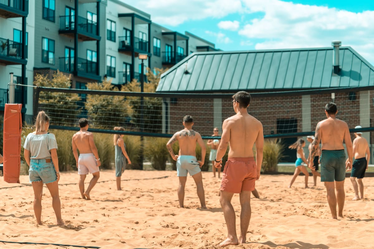Residents playing beach volleyball at The Griff in Columbus, Ohio