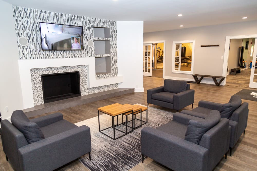 A clubhouse with a large fireplace at Sunbrook Apartments in Saint Charles, Missouri