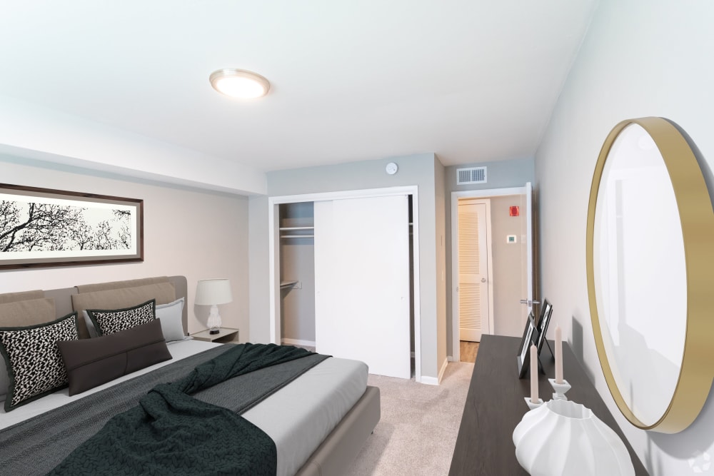 Bedroom with plush carpeting at Gibson Creek Apartments in Madison, Tennessee