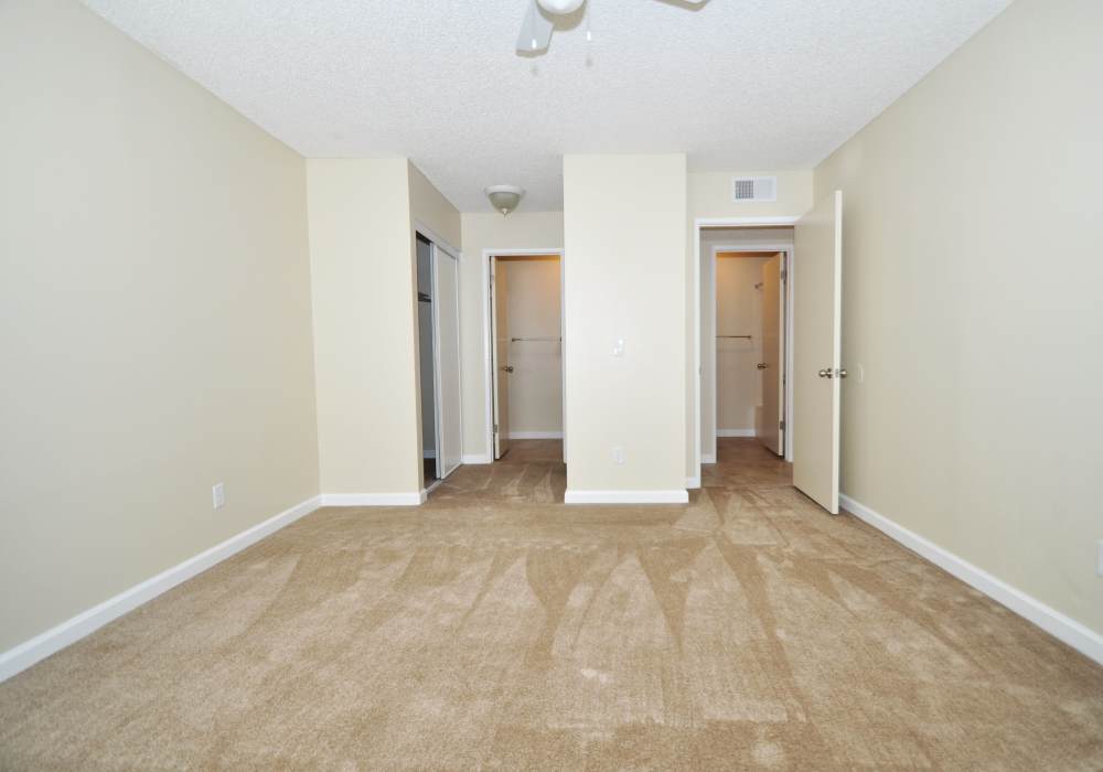 Bedroom with closets at Oak Hill in Escondido, California