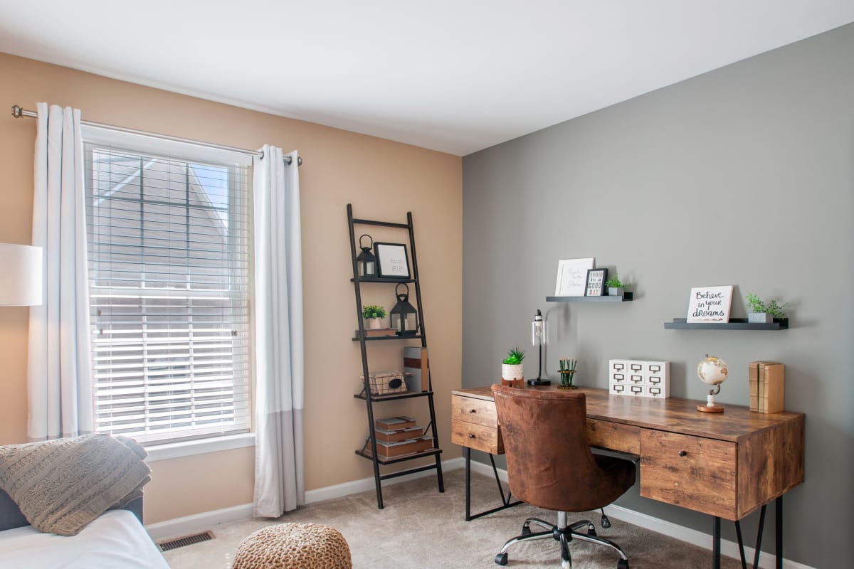 Model bedroom staged as a home office at Montgomery Manor Apartments & Townhomes in Hatfield, Pennsylvania