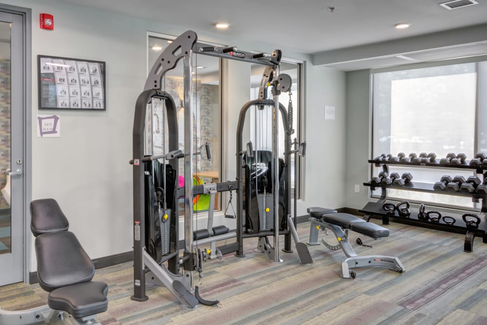 Extensively equipped weight lifting set at Crossings at Olde Towne