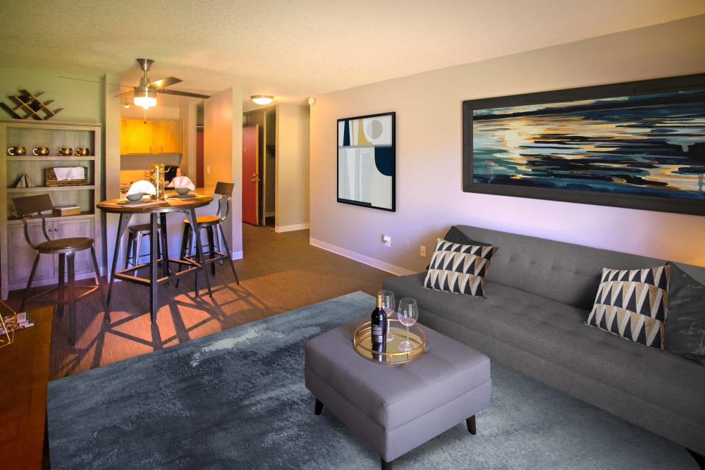 Open floor plan living and dining space areas at Terra Apartment Homes in Federal Way, Washington