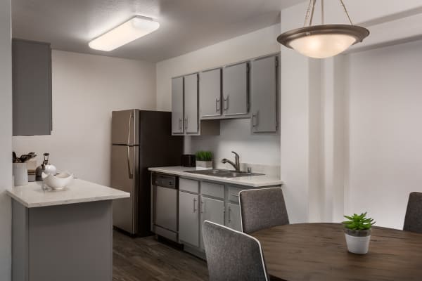 Kitchen next to the dining room at Club Cancun in Chandler, Arizona
