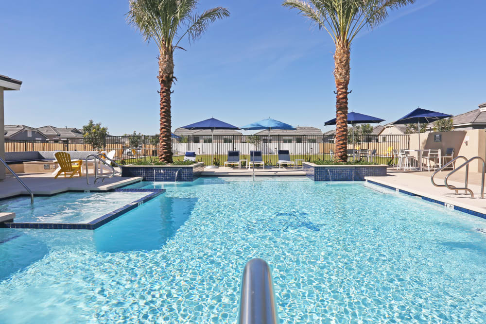 Swimming pool with sundeck at Christopher Todd Communities On Happy Valley in Peoria, Arizona