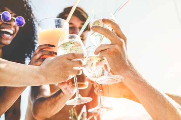 Residents raising their glasses to a great day at Elite North Scottsdale in Scottsdale, Arizona