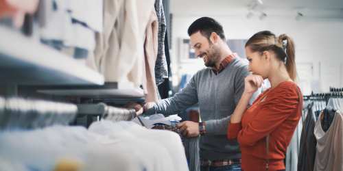 Couple shopping in a cloth store near Hawk's Landing in Fort Myers, Florida