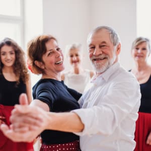 Residents participating in a dance class at Schuyler Commons in Utica, New York.