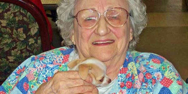 Resident with puppy at Holton Manor in Elkhorn, Wisconsin