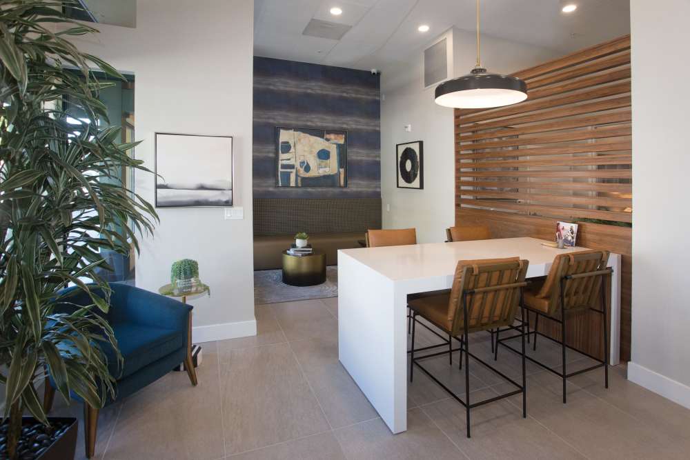 Clubhouse seating with spacious countertops at 1010 Pacific in Santa Cruz