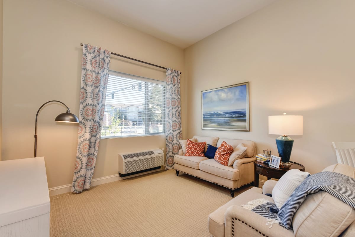 Senior living apartment bedroom at Emerald Valley in Dublin, California