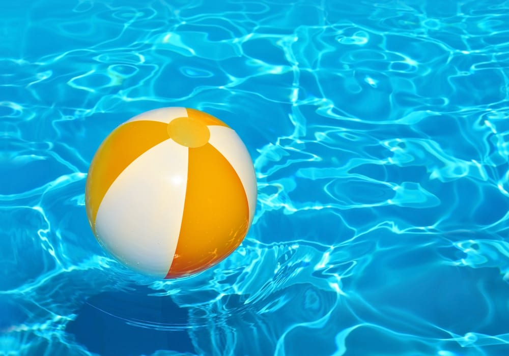 Beach ball sitting on the pools surface at Fountainhead in Jacksonville, Florida