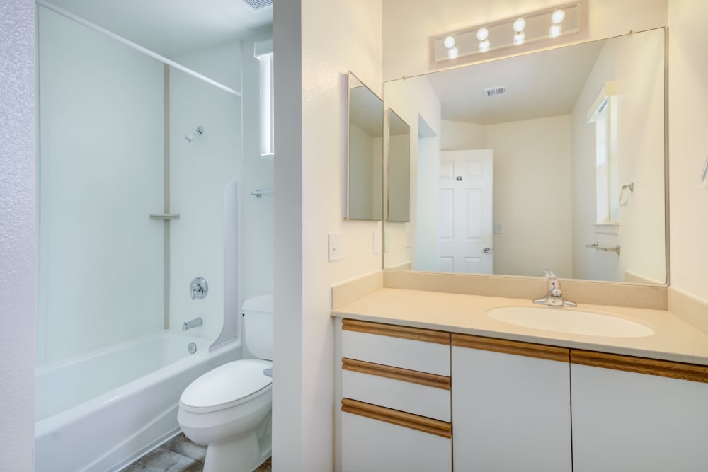 Bathroom with shower/tub combo and sink at Bayview Hills in San Diego, California