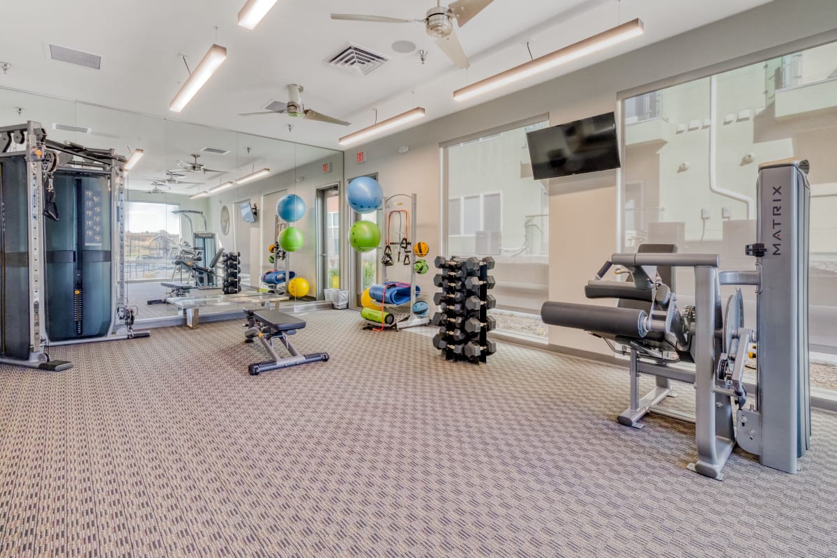Fitness Center with Free Weights at Enchanted Springs Apartments in Colorado Springs, Colorado