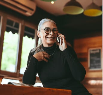 woman on phone smiling