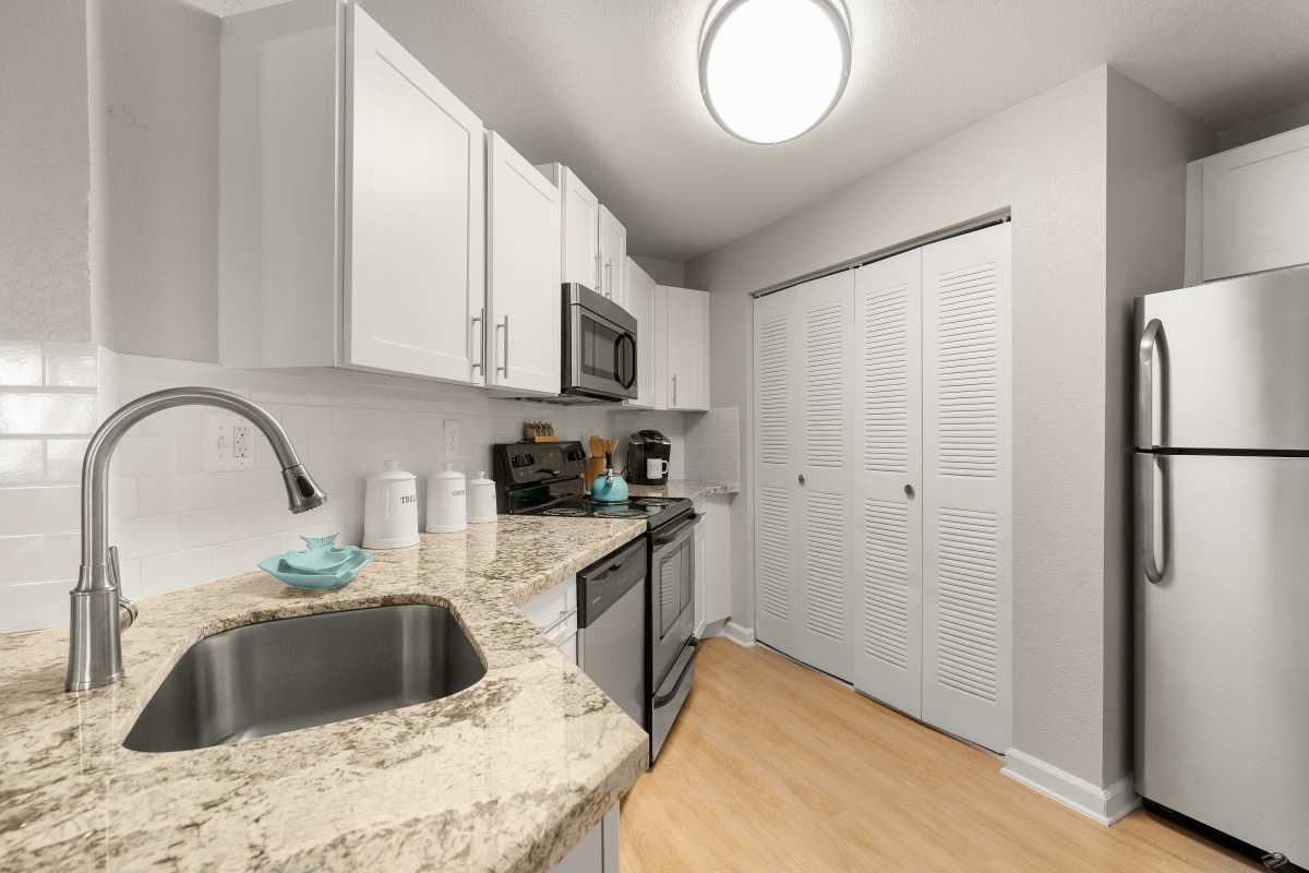 kitchen with granite counter tops at Emerald Palms in Miami, Florida