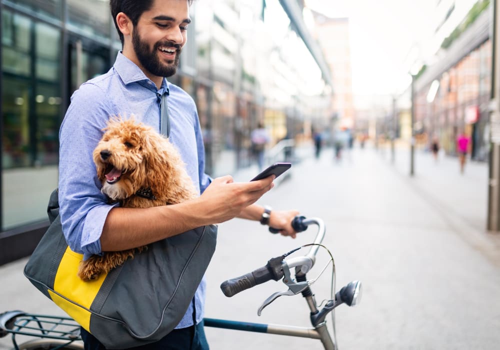 Resident with his dog near lCubix at Othello in Seattle, Washington