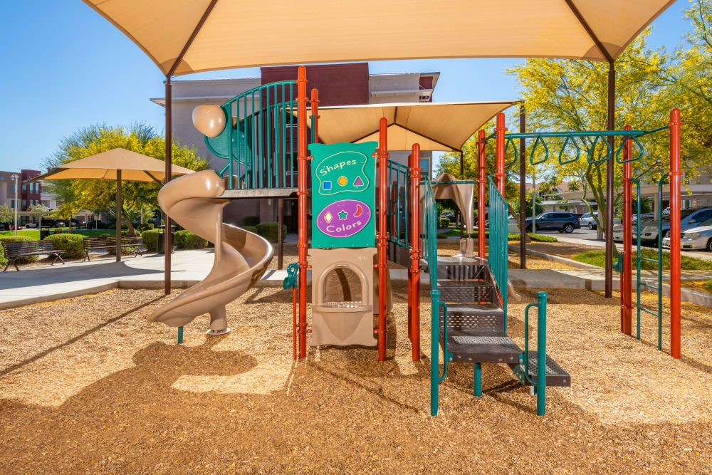 Playground with sun shade  at Southern Avenue Villas in Mesa, Arizona