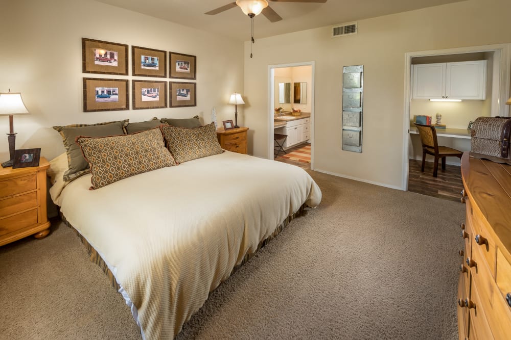 Large master bedroom with en suite bathroom at Stone Oaks in Chandler, Arizona