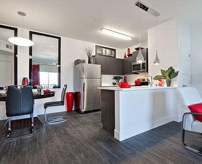 Hardwood floors and beautiful decor in model apartment home at SW Apartments in Las Vegas