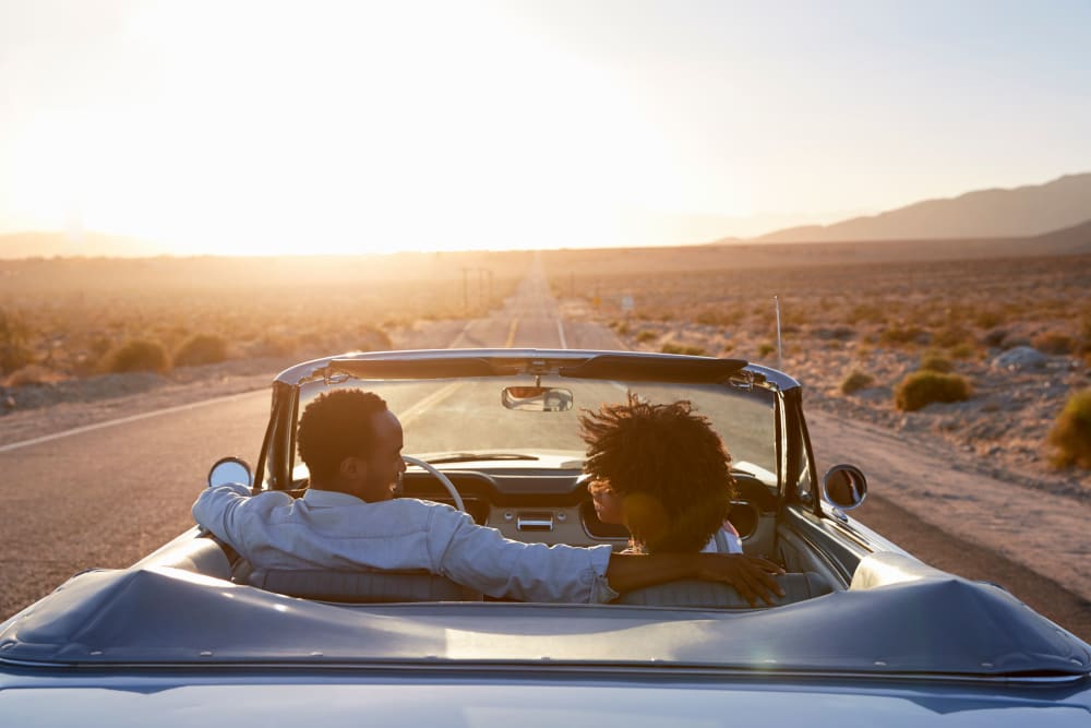 Couple driving in Memphis, Tennessee near Devon Self Storage