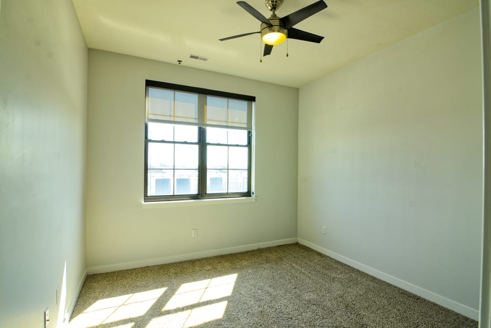 Bright bedroom at Steelyard Apartments in St. Louis, Missouri