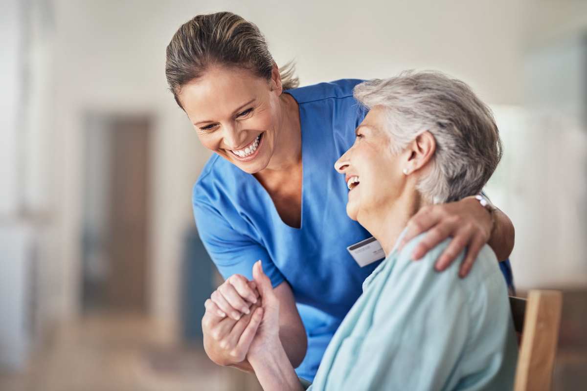 Resident and a nurse at Keystone Place at Beachwalk in Fort Myers, Florida