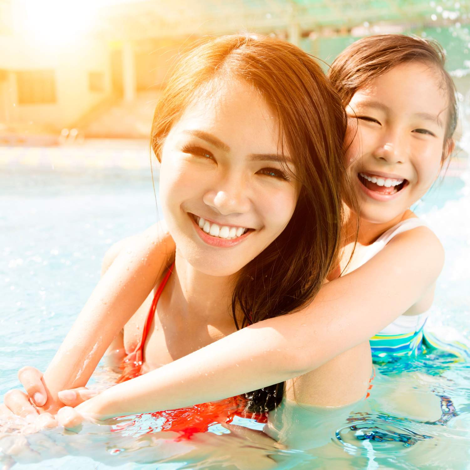 Residents enjoying in the swimming pool at The Elms at Germantown in Germantown, Maryland