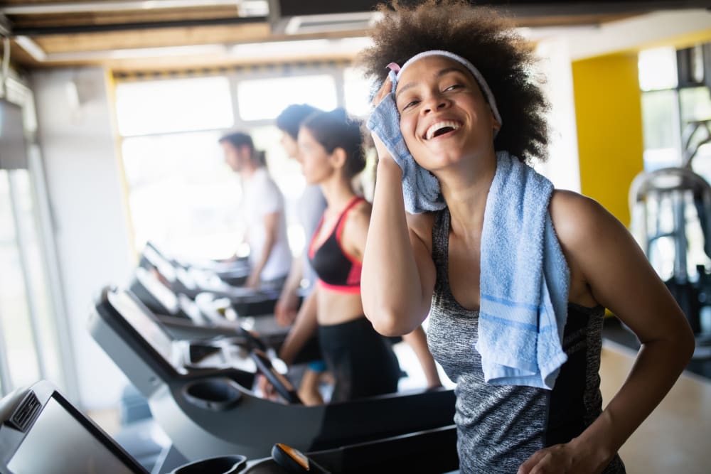 Resident working out about their local gym at Eighteen51 Brinker in Denton, Texas