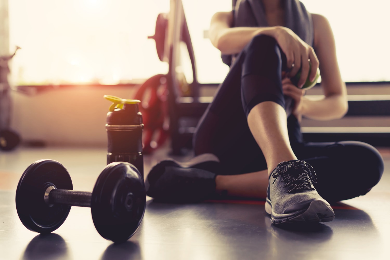 Resident working out at the fitness center at Marketplace Apartments in Vancouver, Washington